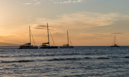 Boats at sunset - beautiful Kaanapali Beach vista, Maui, Hawaiiの写真素材