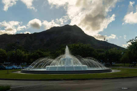 Louise Dillingham Memorial Fountain at sunrise underneath Diamond Head, Honolulu, Oahu, Hawaiiの写真素材