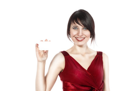 Happy caucasian woman with blank business card, isolated on white backround