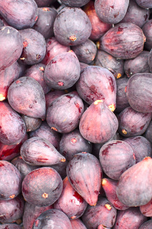 A background of fresh figs at a market