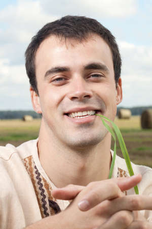 Portrait of an attractive young man outsideの写真素材