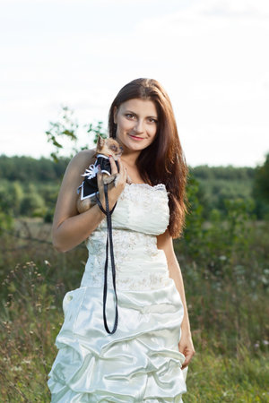 attractive young brunette with unusual make up looking into the cameraの写真素材