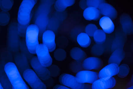 Blue lights background with round spots spireの写真素材