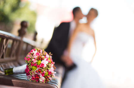 Bride and groom with bridal bouquetの写真素材