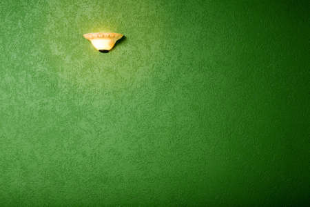 Great background made with a texture of a green wallの写真素材