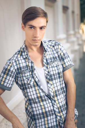 Portrait of handsome man in casual style on urban backgroundの写真素材