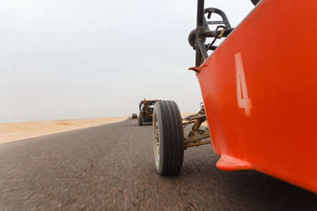 The buggies on walk through the desert in Egypt. Close up shot out of a moving car.の写真素材
