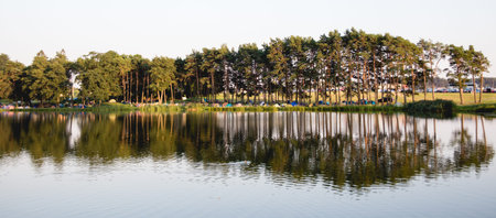 View of the tent camp on the lakeの写真素材