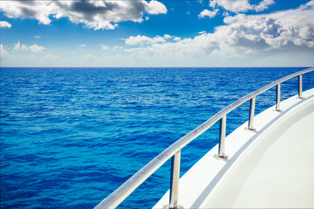 vacation, travel, cruise and leisure concept - close up of sailboat or sailing yacht deck and seaの写真素材