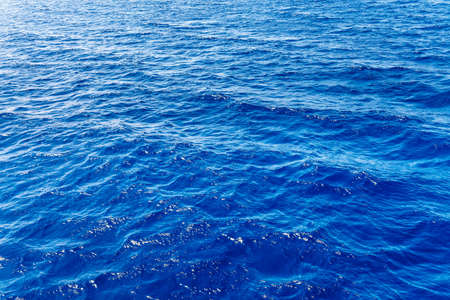 Blue sea surface with waves. Background image.の写真素材