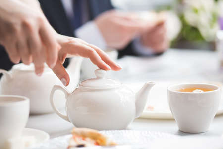 Female brews. The picture was taken during tea party.の写真素材