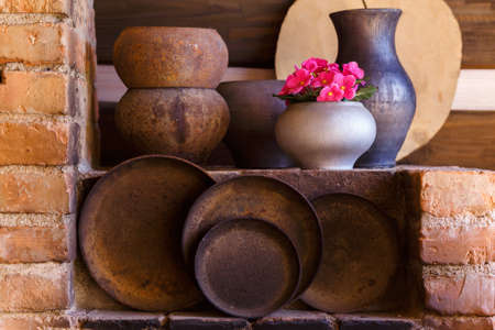 Close up of old pots and pans in the kitchenの写真素材