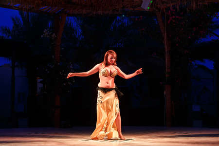 HURGHADA, EGYPT - MAY 18: Belly dancer performing in front of a crowd in bedouin village near by Hurghada, Egypt on May 18, 2015のeditorial素材