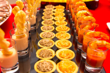 the cocktail sauce with shrimp on the buffetの写真素材