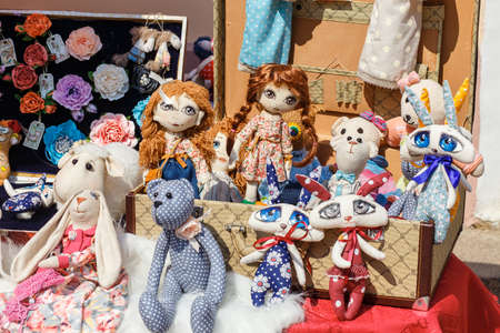 HRODNA, BELARUS - MAY 21, 2016: Exhibition sale of dolls on Sovetskaya street in historic city centre, Grodno, Belarusのeditorial素材