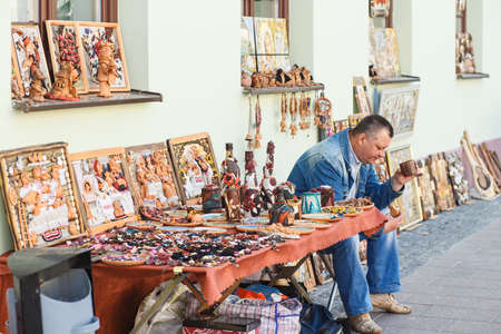 HRODNA, BELARUS - MAY 21, 2016: Sale of colourful souvenir pottery on Belarusian topics at the street shop on the Sovetskaya street in Grodno, Belarusのeditorial素材