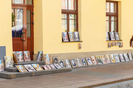 HRODNA, BELARUS - MAY 21, 2016: Paintings for sale on the floor in historical center of Grodno, Belarus.のeditorial素材