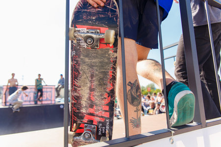 GRODNO, BELARUS - JUN 18: The tattooed legs of one of the participants of Skateboard Challenge 2016 in Grodno, Belarus, June 18, 2016のeditorial素材