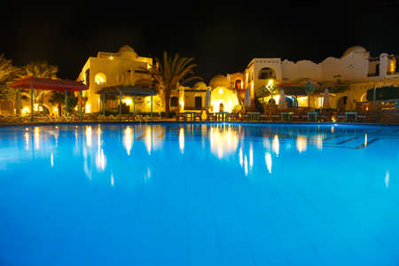 HURGHADA, EGYPT - MAY 20: Water pool at night in Arabella Azur Resort, Hurghada, Egypt. May 20, 2015のeditorial素材