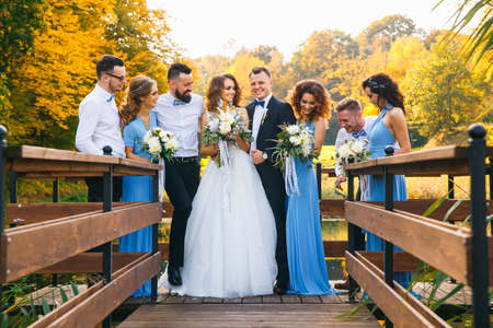 Groomsmen and bridesmaids with newly married on wedding ceremonyの写真素材