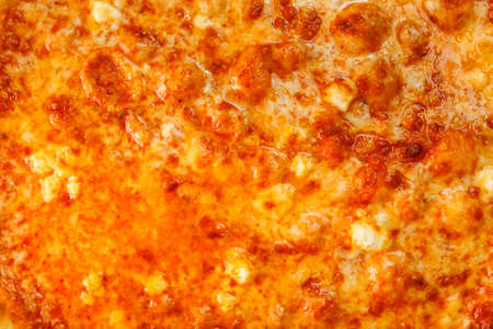 Background of delicious classic Hawaiian Pizza with chicken, pineapple and cheeseの写真素材