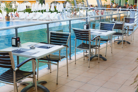 NESSEBAR, BULGARIA - AUG 26: Outdoor area with tables for visitors to the restaurant in hotel Marvel, Nessebar, Bulgaria at August 26, 2016のeditorial素材