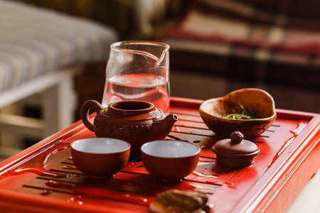 The process of brewing tea at the tea ceremony. The lid of the kettle opened to brew tea.の写真素材