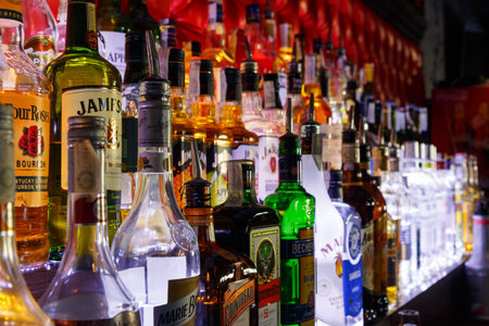 GRODNO, BELARUS - MAY 01, 2017: Blurred alcohol bottles on a bar at the bar London.