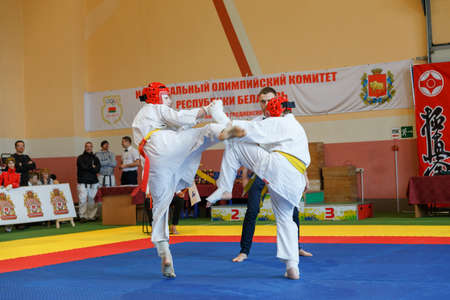 GRODNO, BELARUS - APRIL 22, 2017: Battle of the two fighters on Championship among juniors of the Grodno region Kyokushin karateのeditorial素材