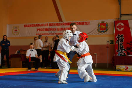 GRODNO, BELARUS - APRIL 22, 2017: Battle of the two fighters on Championship among juniors of the Grodno region Kyokushin karate