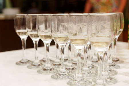 Many glasses of alcoholic beverage for tastingの写真素材
