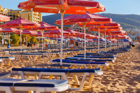 NESSEBAR, BULGARIA - SEP 02, 2016: Beach umbrellas and sun loungers on a beach at sunrise in Nessebar, Bulgaria at September 02, 2016のeditorial素材