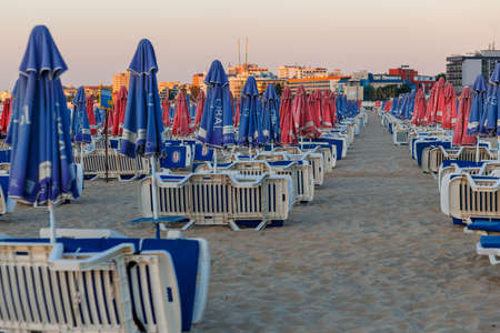 NESSEBAR, BULGARIA - SEP 02, 2016: Beach umbrellas and sun loungers on a beach at sunrise in Nessebar, Bulgaria at September 02, 2016のeditorial素材