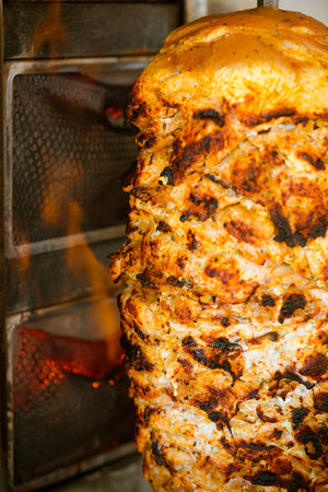 Chicken meal roasted on the fire before making a sandwichの写真素材