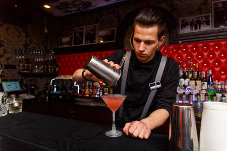 Grodno, Belarus - May 06, 2017: The bartender working in the London barのeditorial素材