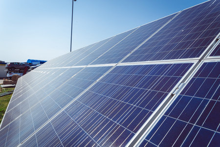 Background of Blue Solar Panels with reflection of sun