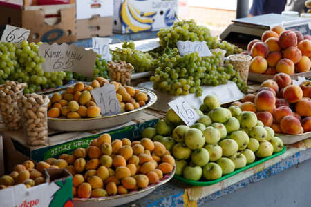 Lazurnoe, Ukraine - July 28, 2017: Fresh organic fruits at farmers market stallのeditorial素材