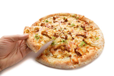 Hand taking slices of delicious pizza with bacon, chanterelles, wasabi and cheese on white backgroundの写真素材