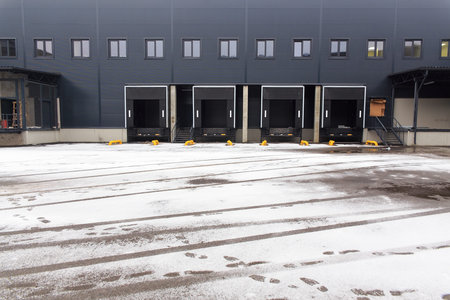 A distribution warehouse with cargo doors for loading goods 