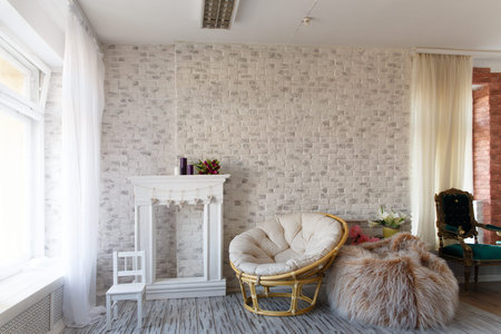 Photo Studio with natural light designed as a bright room with light furniture and decor