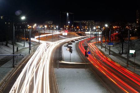 Night view of blurred car lights on the central city streets at evening time