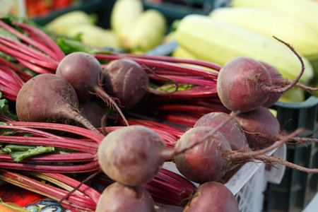 Ripe beet on the counter of the Belarussian market. Fresh vegetables in the street bazaar.の写真素材