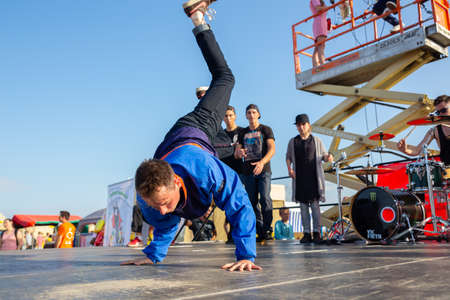 Grodno, Belarus - July 23, 2016: Street dancer dance break-dance on scene at the international automobile festival Sunday 2016のeditorial素材
