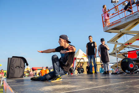 Grodno, Belarus - July 23, 2016: Street dancer dance break-dance on scene at the international automobile festival Sunday 2016のeditorial素材