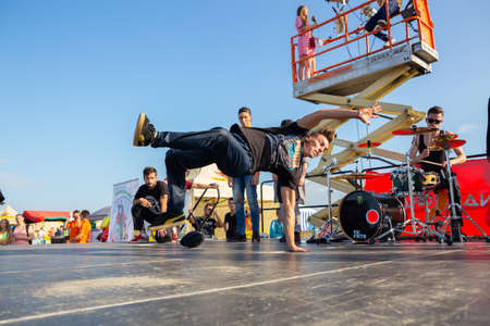 Grodno, Belarus - July 23, 2016: Street dancer dance break-dance on scene at the international automobile festival Sunday 2016のeditorial素材