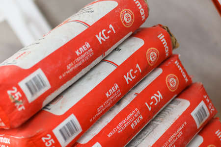 Grodno, Belarus - June 20, 2018: Shelves with dry plaster, cement and putty in a building materials storeのeditorial素材