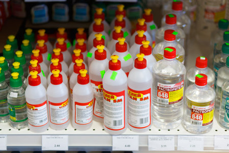 Grodno, Belarus - June 20, 2018: Various choice of glue and solvent in the building materials store...