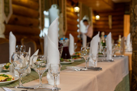 Food served on table in a wooden manor house during a birthday party or wedding in Eastern Europeの写真素材
