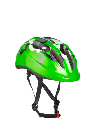 A studio shot of a black and green helmet for byciclist isolated on white background. Bicycle helmet with a strap for fixing on the head.の写真素材