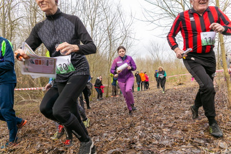Grodno, Belarus - 26 March, 2023: Mass start of the relay at competitions in outdoor orienteering Grodno Forest Day. Belarus, hobby sport.のeditorial素材